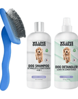Set image with a blue slicker brush and two white bottles labeled Dog Shampoo and Dog Detangler from We Love Doodles on a clean background.