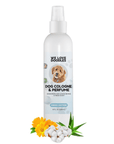 White We Love Doodles dog cologne in the Fresh Cotton scent on a white background. Cotton bolls, calendula flowers, and aloe leaves sit in front of the bottle.