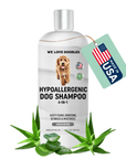 White bottle labeled Hypoallergenic Dog Shampoo 4-in-1 unscented with a Made in USA tag. Aloe leaves sit around the base of the bottle on a clean white background.