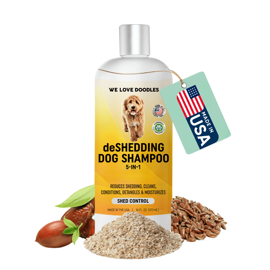 White bottle with a yellow label and a dog photo. A blue Made in USA hang tag is attached. Oats, flax seeds, and a shea nut sit at the base on a white background.