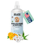 White spray bottle with a light blue label reading Dog Cologne and Perfume Fresh Cotton. A Made in USA tag hangs beside it. Calendula flowers cotton bolls and aloe leaves sit at the base. 8 fl oz size shown.