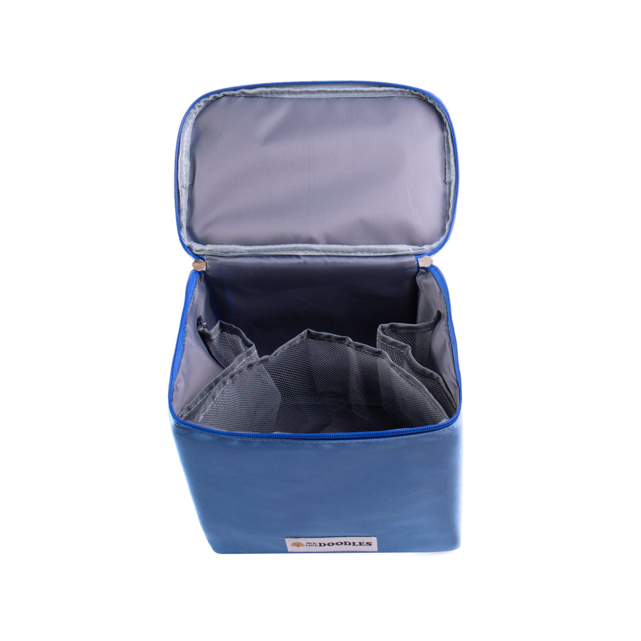 Top view of the open bag showing gray lining and several mesh pockets around the sides for organizing tools and small bottles.