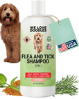 White 16 oz bottle with a green label that reads Flea and Tick Shampoo 5 in 1 peppermint. A fluffy brown dog sits beside mint leaves, ground spice, and rosemary with a Made in USA tag.
