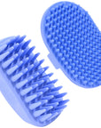 Studio photo of two blue grooming brushes. One has long conical pins for deep scrubbing and one has short nub bristles for gentle cleaning.
