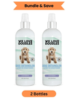 Two white 16 oz spray bottles labeled We Love Doodles Dog Detangler Leave In Conditioner Lavender shown side by side with a Bundle and Save ribbon and a 2 Bottles tag.