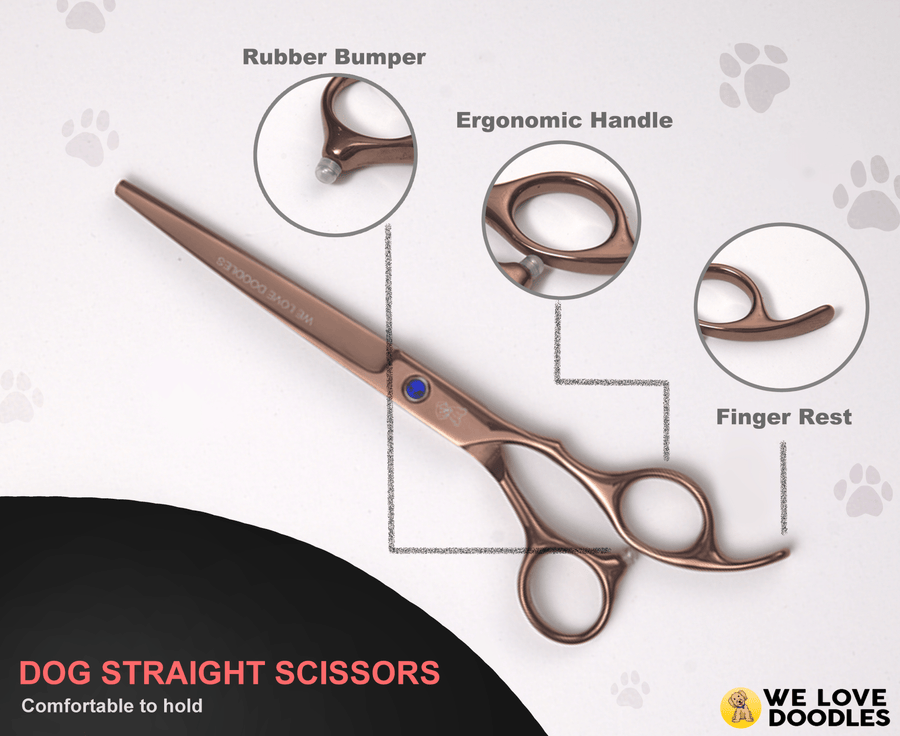 Product image of rose gold straight grooming scissors with labels for rubber bumper, ergonomic handle, and finger rest.